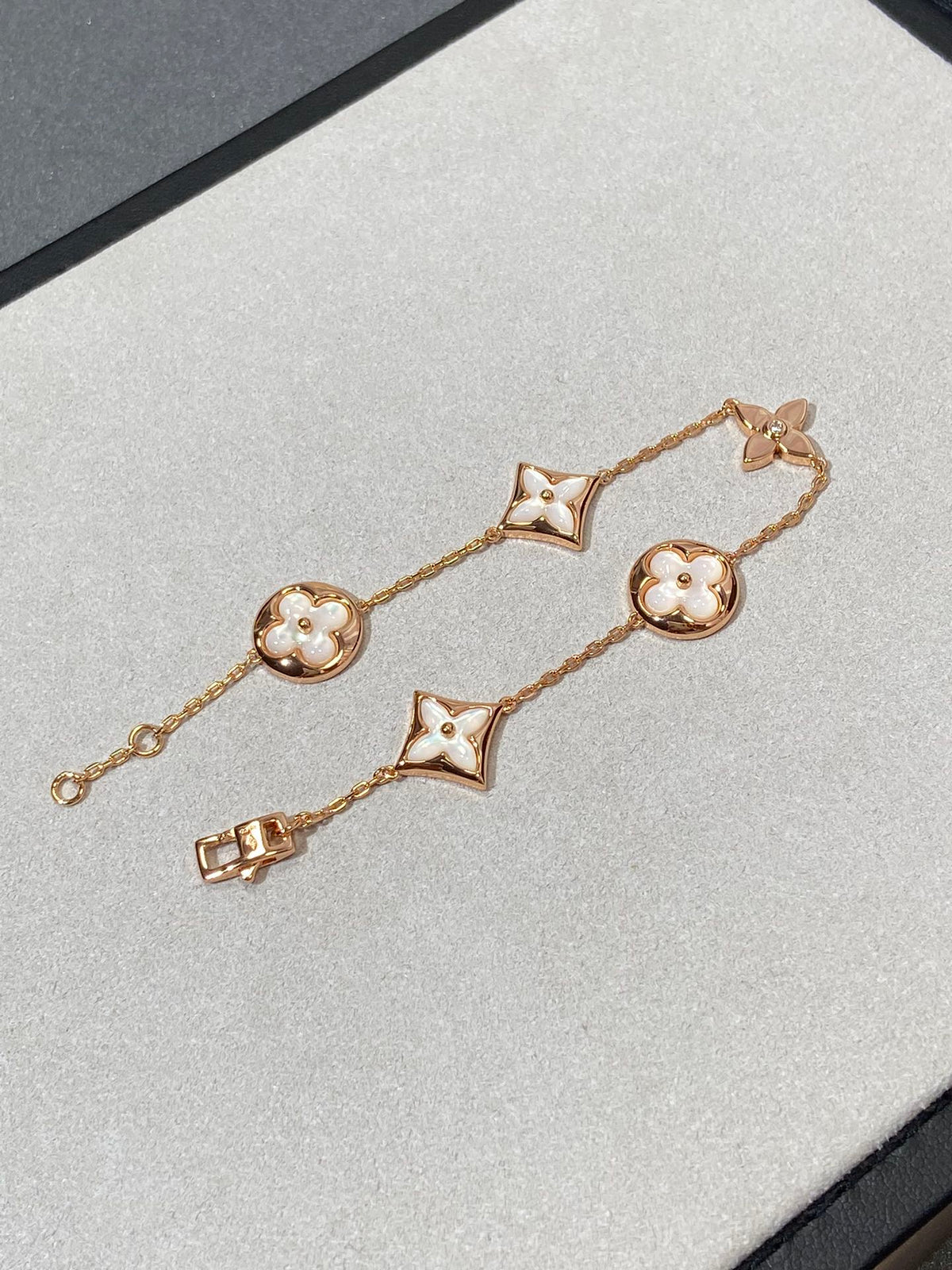 [Renovia Jewelry]STAR AND SUN 5 MOTIF MOP PINK GOLD BRACELET